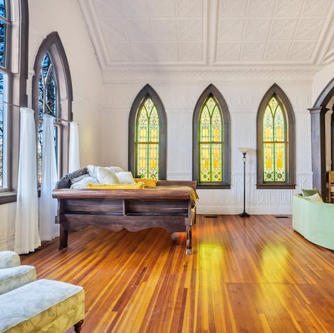 Lounge like a sultan on the California king-size bed in the living room