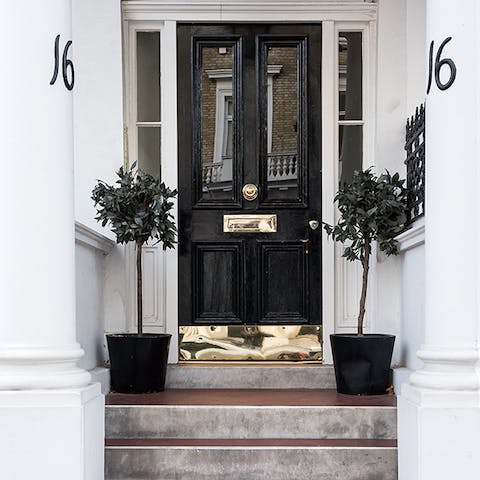 Entering through The White Stucco Entrance
