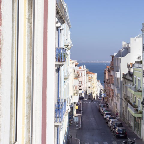 Admire the Tagus River views from the small balcony