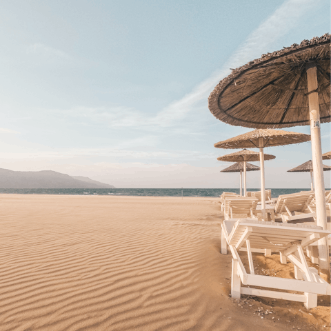 Sprawl out on the sand at nearby Otzias Beach, just a ten-minute drive away