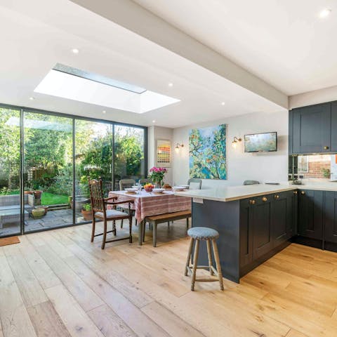 Rustle up strawberries and cream in the contemporary kitchen