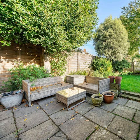 Enjoy an alfresco glass of Pimm's in the garden