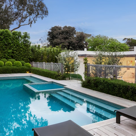 Find peace and relaxation while lounging by the pool