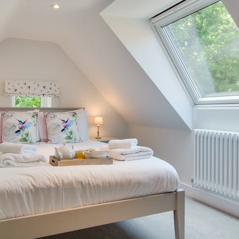 Sleep soundly in the pretty main bedroom on the top floor