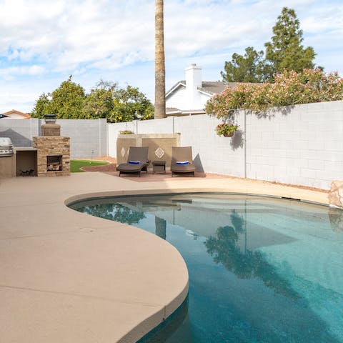 Relax by the pool and work on your tan
