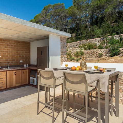 Dine alfresco as the Spanish sun warms your skin