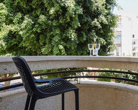 The small balcony with green views