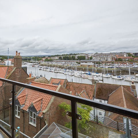 Admire harbour views from the balcony