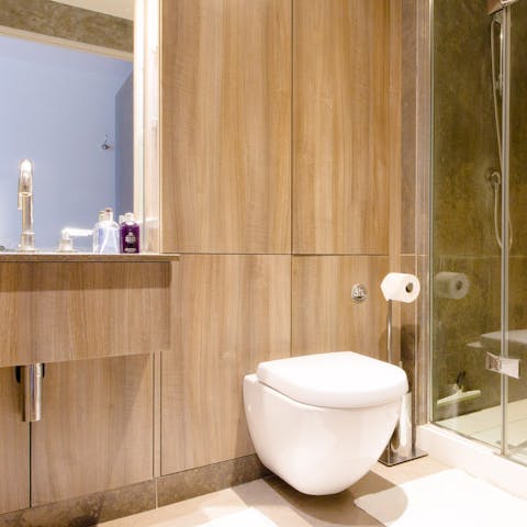 The wood and marble bathroom