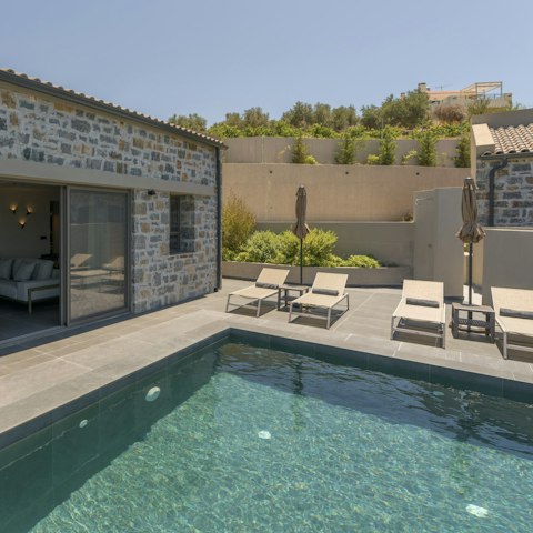 Unwind by the pool with a cocktail