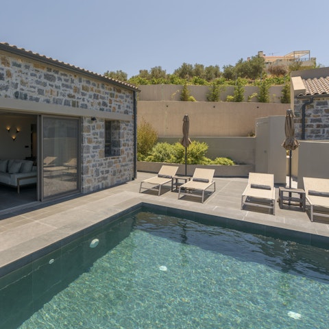 Unwind by the pool with a cocktail