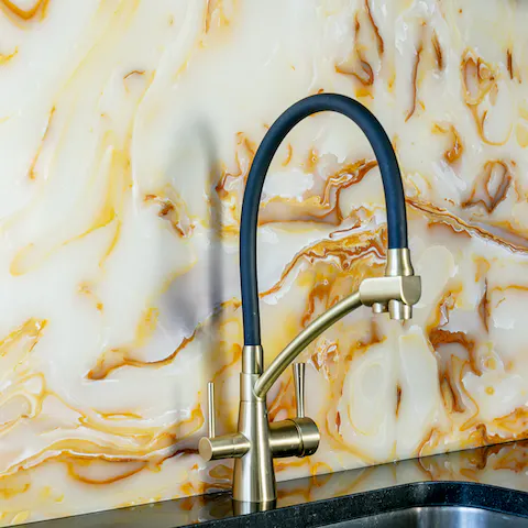 The marble-clad kitchen