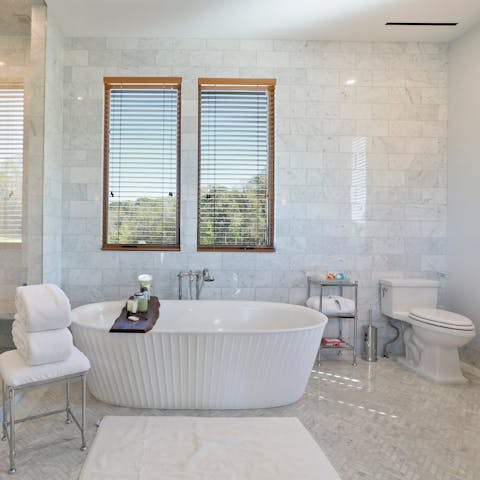 Soak in the bathtub to rest your weary feet