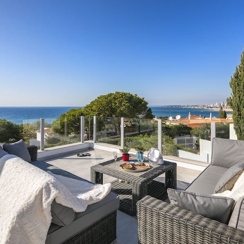 Head up to the rooftop terrace for a stunning sea view