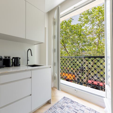 Take in the views of this typically Parisian street from the Juliet balcony