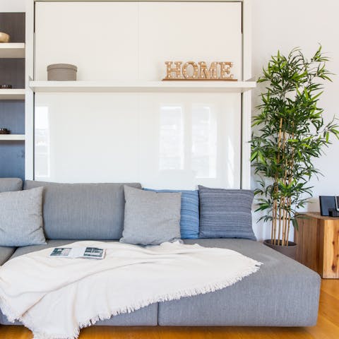 Kick back on the comfortable, deep set sofa
