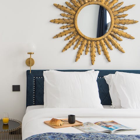 Enjoy a pain au chocolat and a coffee in bed