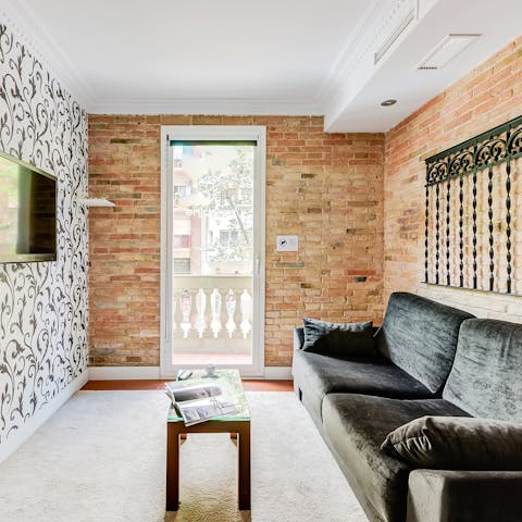 The exposed brick in the living room