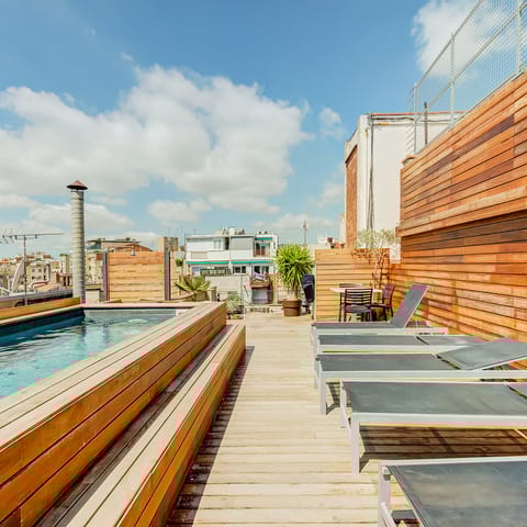 A communal terrace with pool