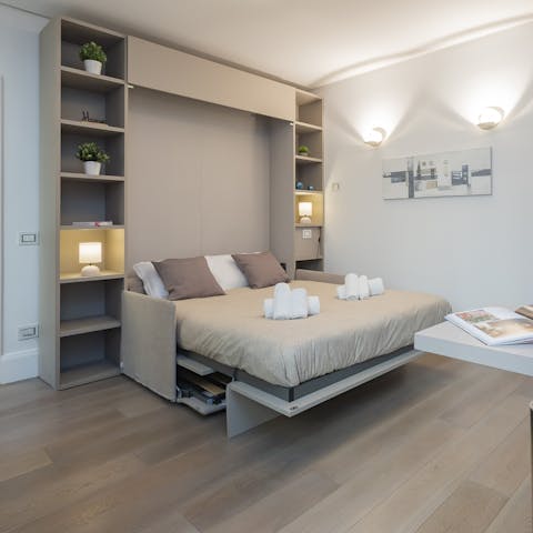 Sink into the cosy sofa bed after a long day of sightseeing