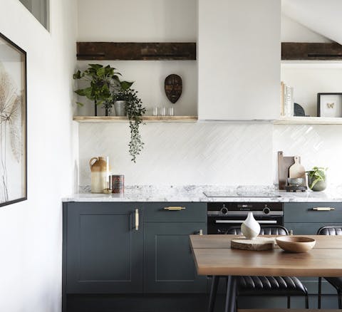 Admire original features such as the wooden beams in the kitchen
