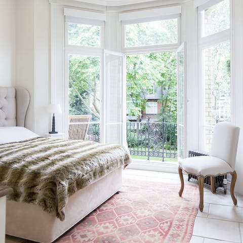 Wake up to garden views in the master bedroom, with access to the terrace