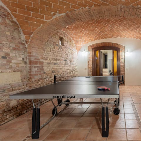 Play a round or two of ping-pong in the games room