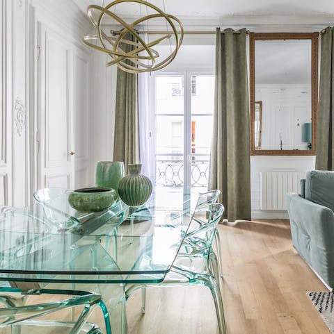 Floor to ceiling windows drench the room in light