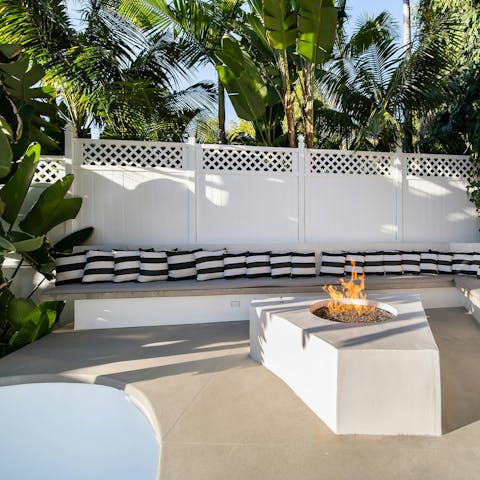 Enjoy sundowners around the outdoor firepit