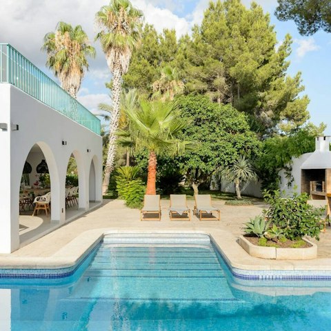 Relax by the private pool in the Balearic sun