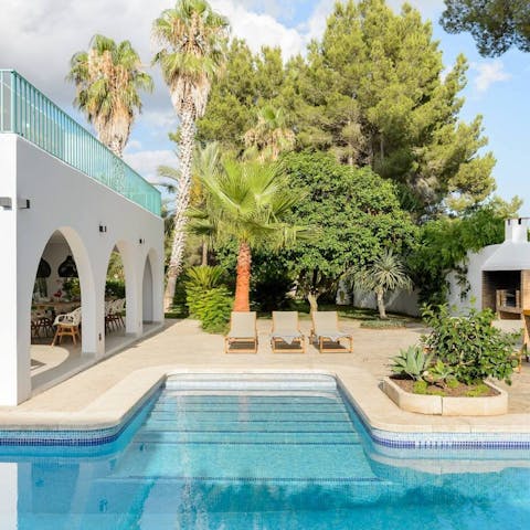 Relax by the private pool in the Balearic sun