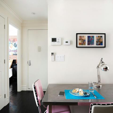 Sit down on the chic pink chairs for a tasty lunch