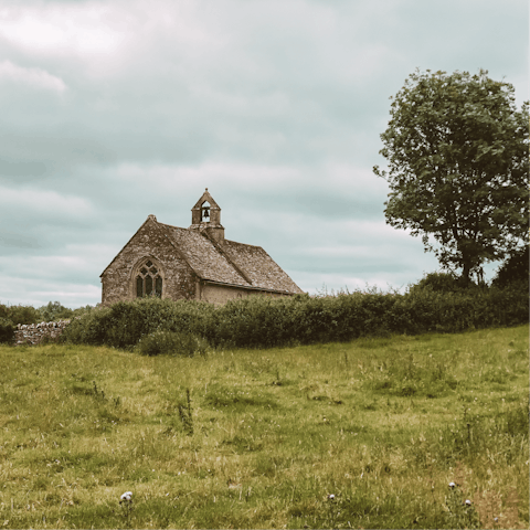 Explore the rolling hills of the Cotswolds countryside