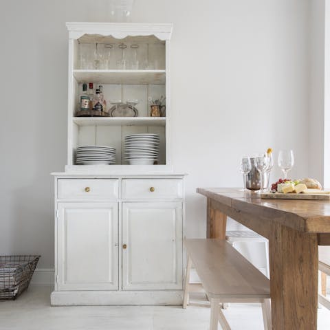 Devour a cheese board in the rustic country-style dining area