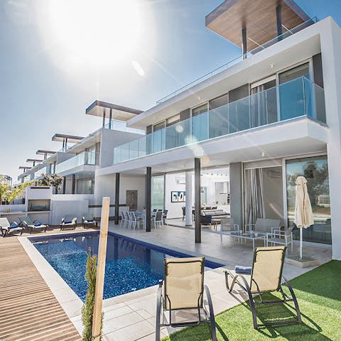Take full advantage of this home's vibrant social space, whether gathering for afternoon cocktails or feasting on lunchtime barbecues