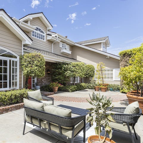 Make the most of the early morning sun as you sip a coffee out front