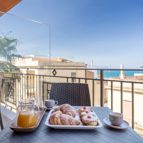Enjoy breakfast with a view on the balcony