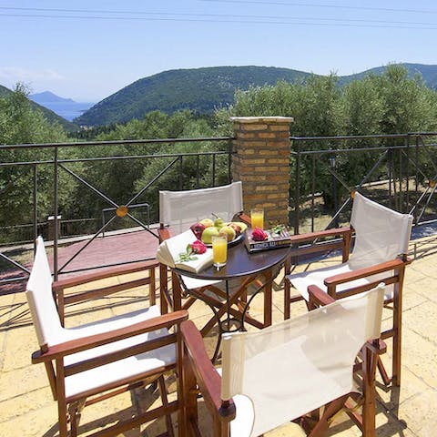 Enjoy watching the fiery sun dip behind the mountains around the small table, sipping on wine while playing cards