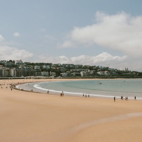 Go for a swim at La Concha Beach, five minutes away