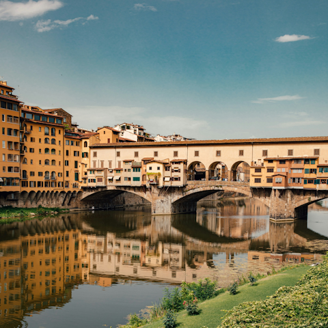 Take a stroll across the Ponte Vecchio to the historic centre