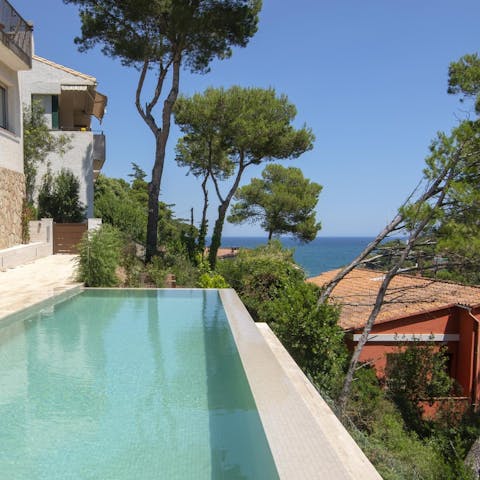 Take a refreshing dip in the communal swimming pool