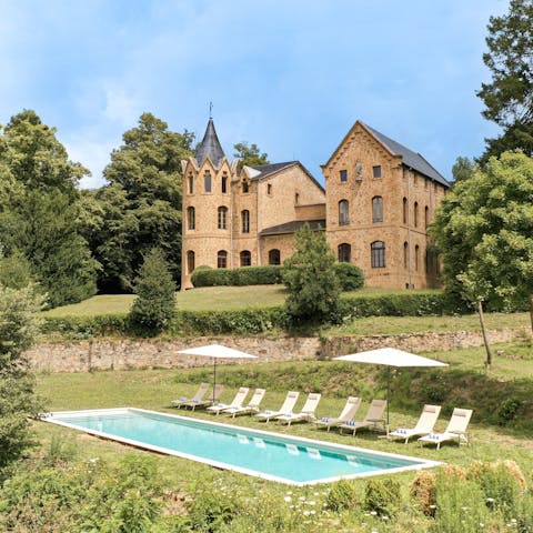 Relax by the private pool in front of the castle