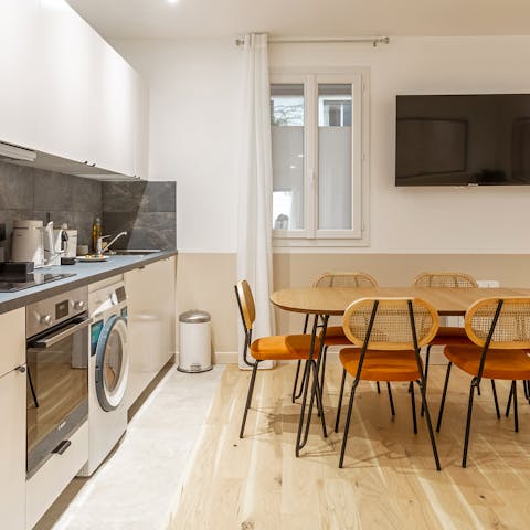 Gather for meals in the open-plan kitchen-diner