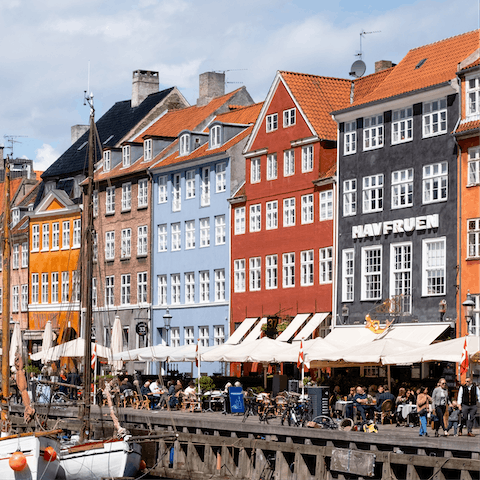 Marvel at the coloured buildings in Nyhavn, just around the corner