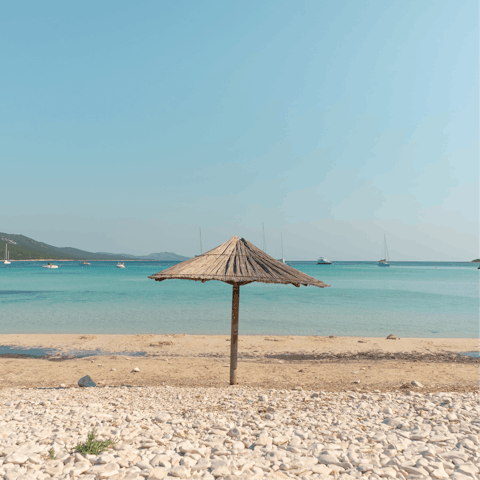 Sunbathe on the Costa Blanca when you visit the Playa de l'Ampolla, 2km away