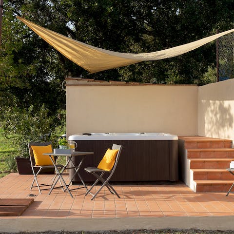 Slip into the bubbling hot tub at the end of the day to unwind