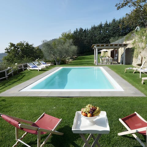 Swim laps in the pool overlooking the Chiana Valley