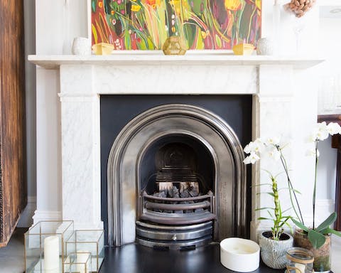 Light up the fireplace in the colder months and get cosy in the living room