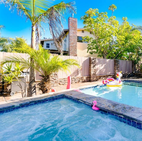 Pour yourself a cocktail from the wet bar and take it to the jacuzzi