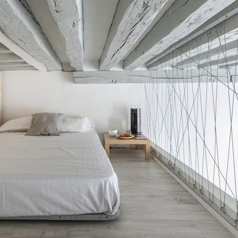 White wooden beams and metal room divider
